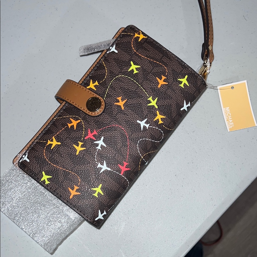 Michael Kors Brown Wallet with Colorful Airplane Design